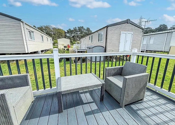 Modern Caravan At Caldecott Hall With Decking In Norfolk, Sleeps 8 Ref 91068C