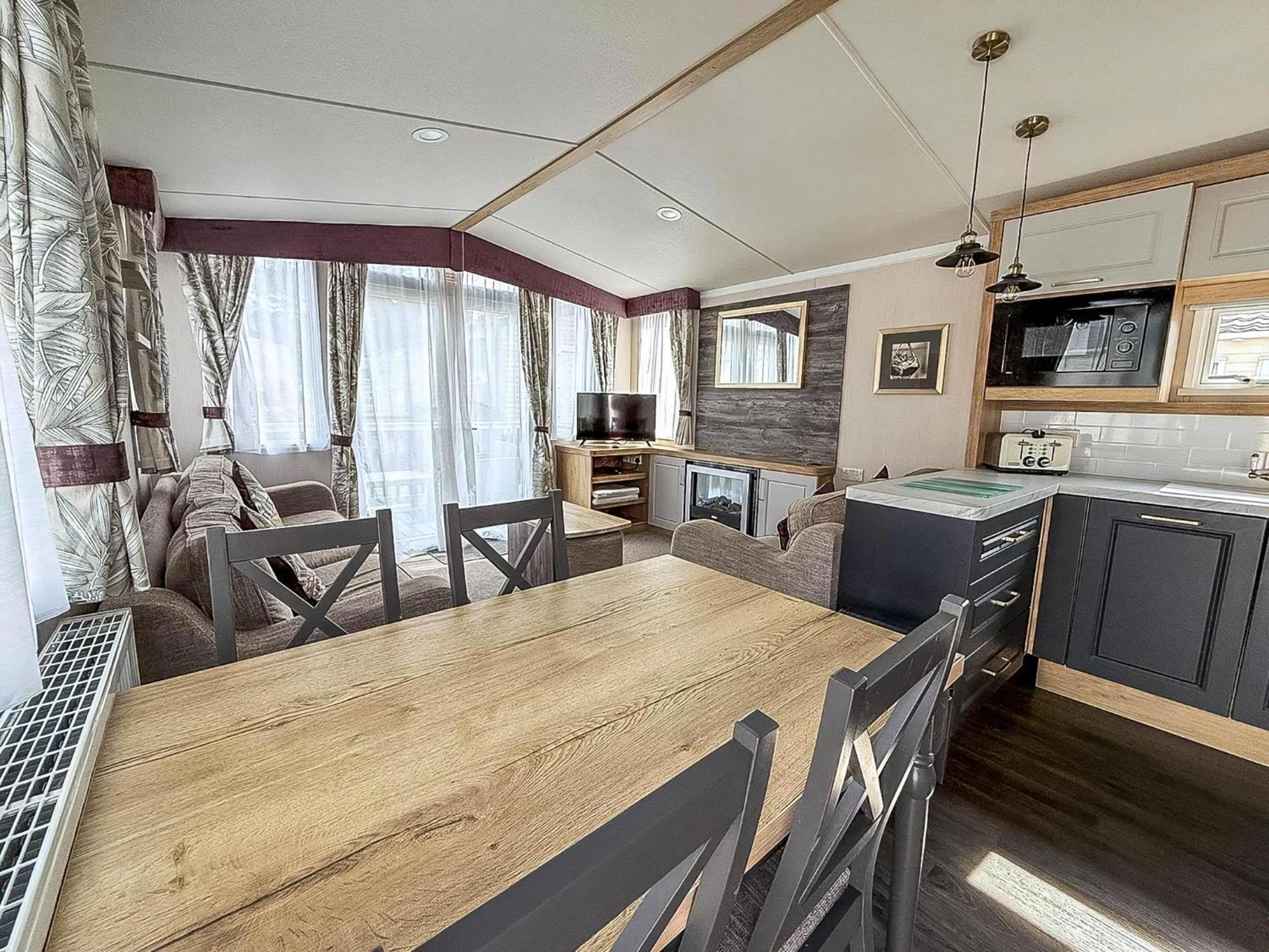 Modern Caravan At Caldecott Hall With Decking In Norfolk, Sleeps 8 Ref 91068c *